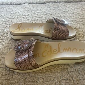 Sam Edelman sandals in pink snake print leather.